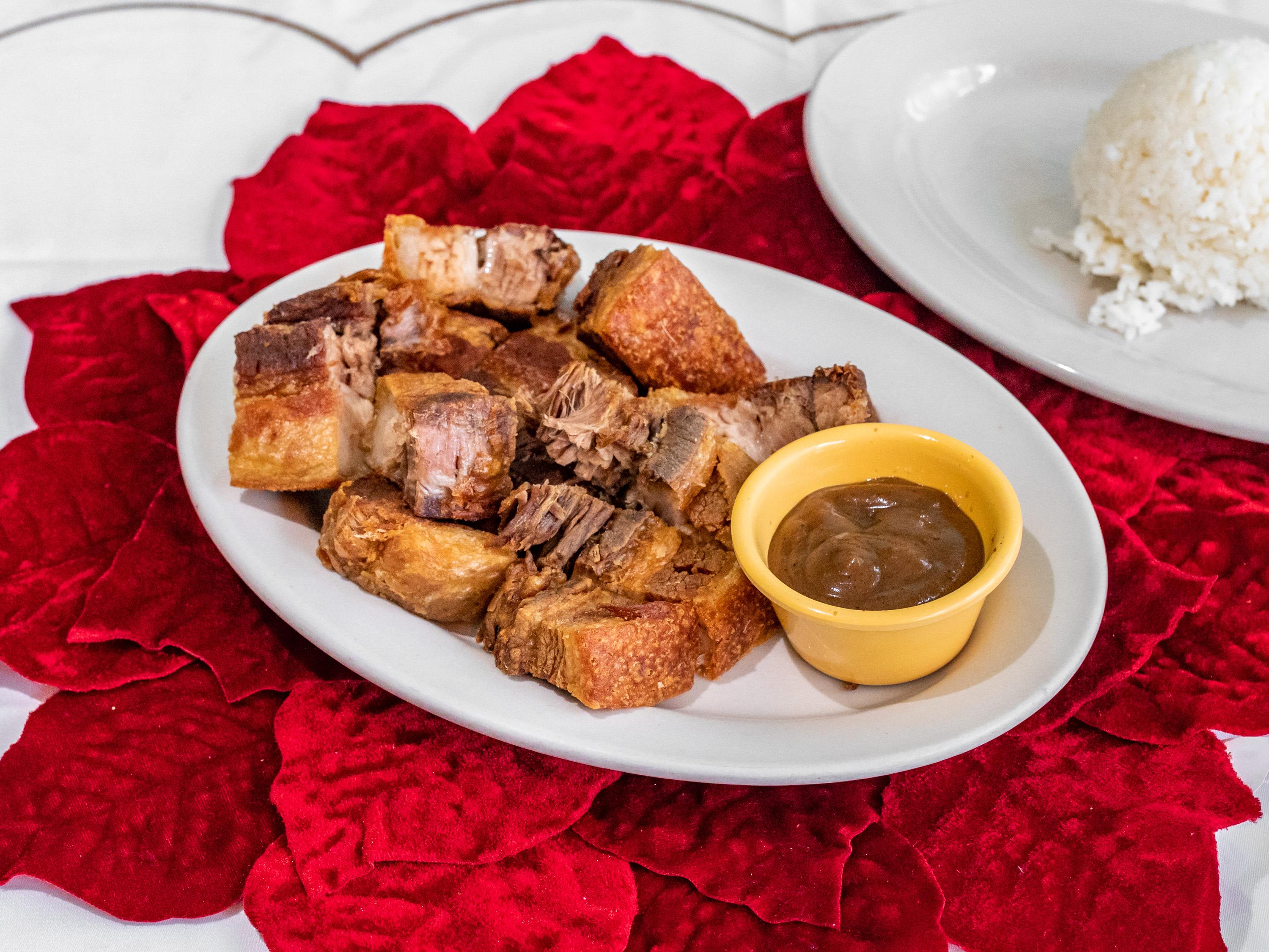 Order Lechon Kawali with Rice food online from Steak House store, Chicago on bringmethat.com