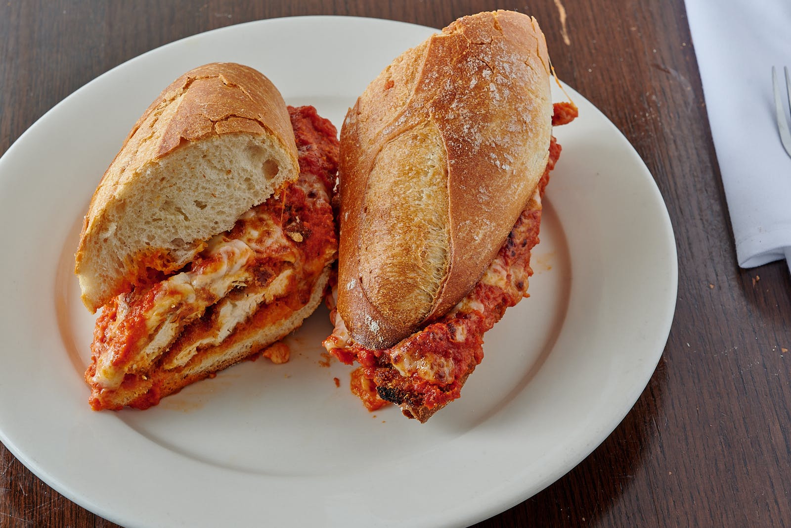 Order Chicken Parm Sandwich - 10" food online from Mario's Restaurant store, Clifton on bringmethat.com