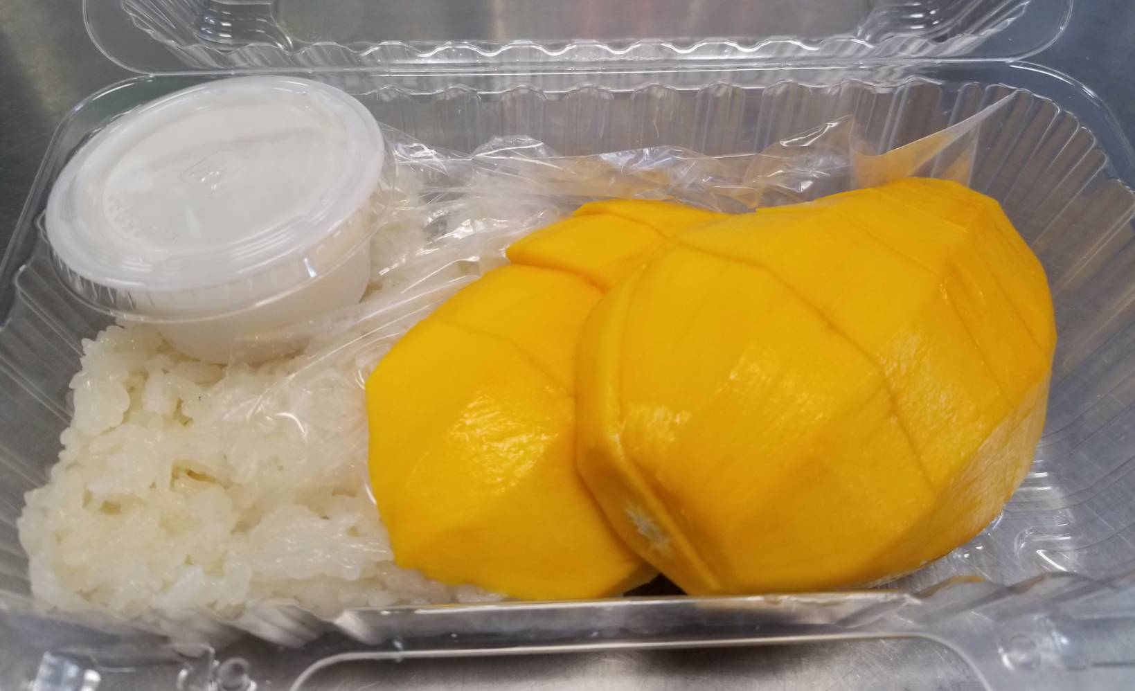 Order Mango Sticky Rice food online from Sizzling Wok store, Long Beach on bringmethat.com