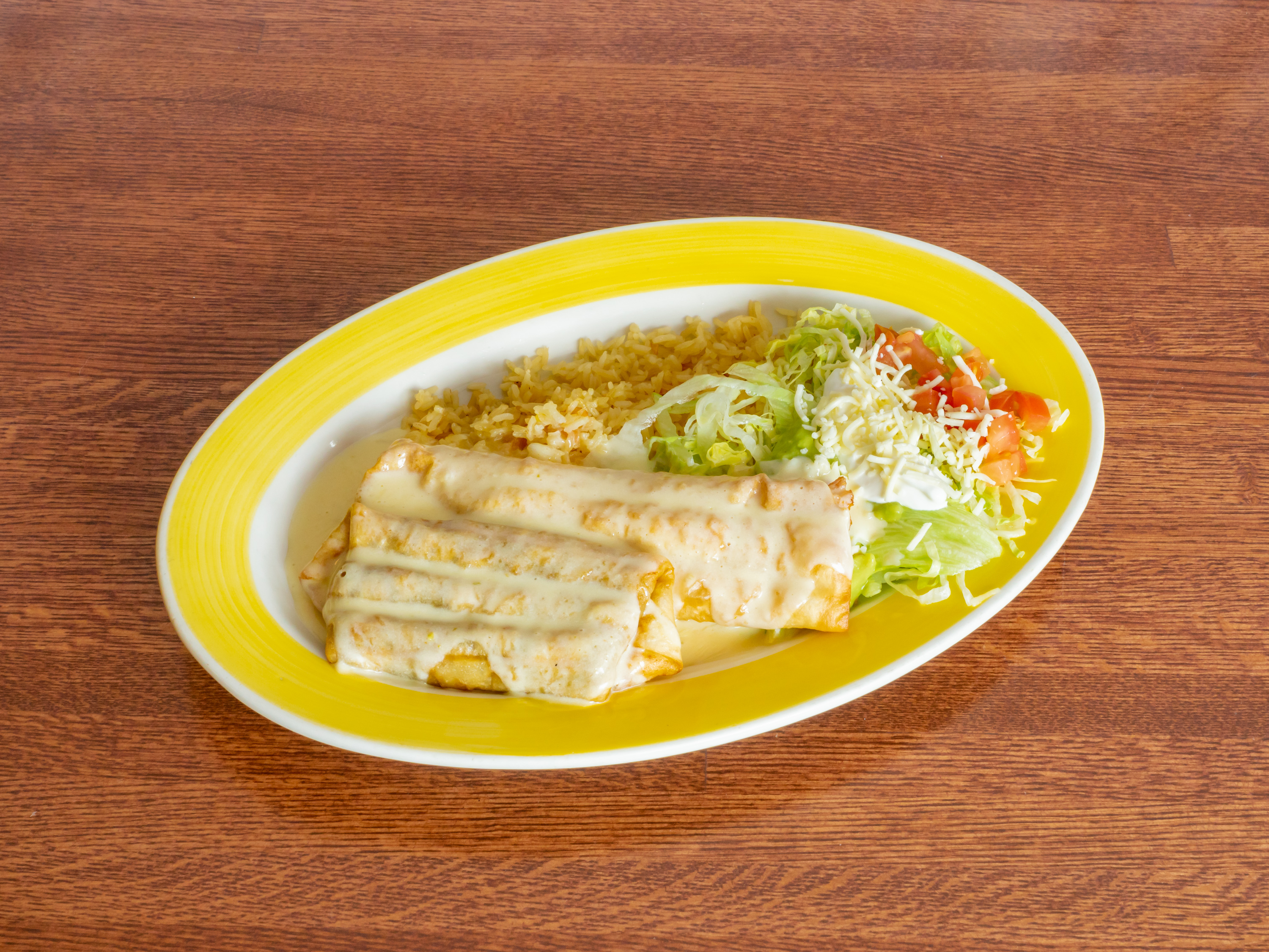 Order Grilled Chimichanga food online from El Loro Mexican Grill store, Bloomington on bringmethat.com