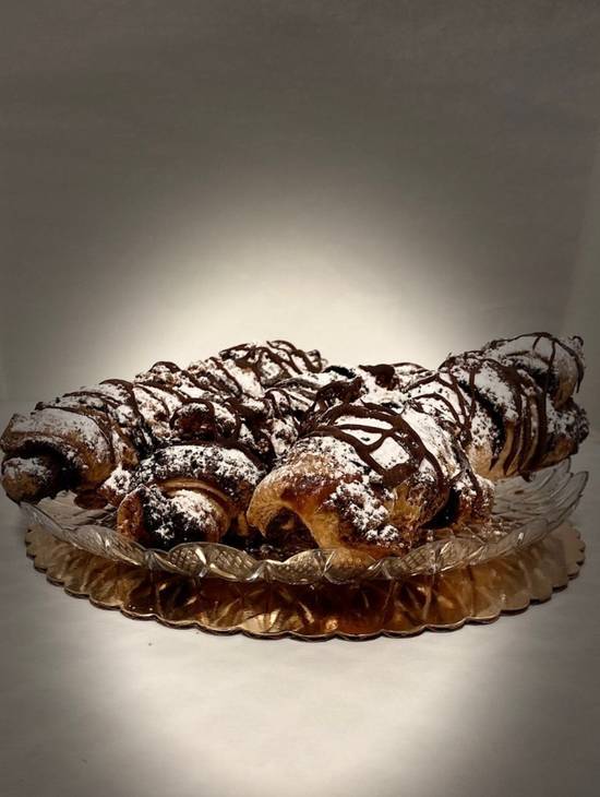 Order Chocolate Cigar Puff Pastry food online from Dortoni Bakery- East Norwich store, East Norwich on bringmethat.com