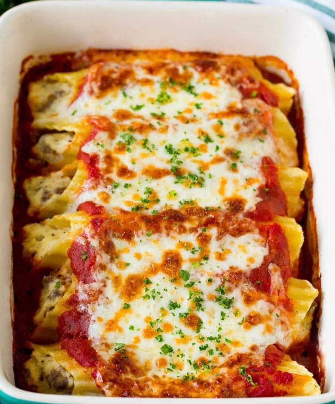 Order Baked Manicotti Lunch - Pasta food online from Bella Sera Italian Restaurant store, Copperas Cove on bringmethat.com