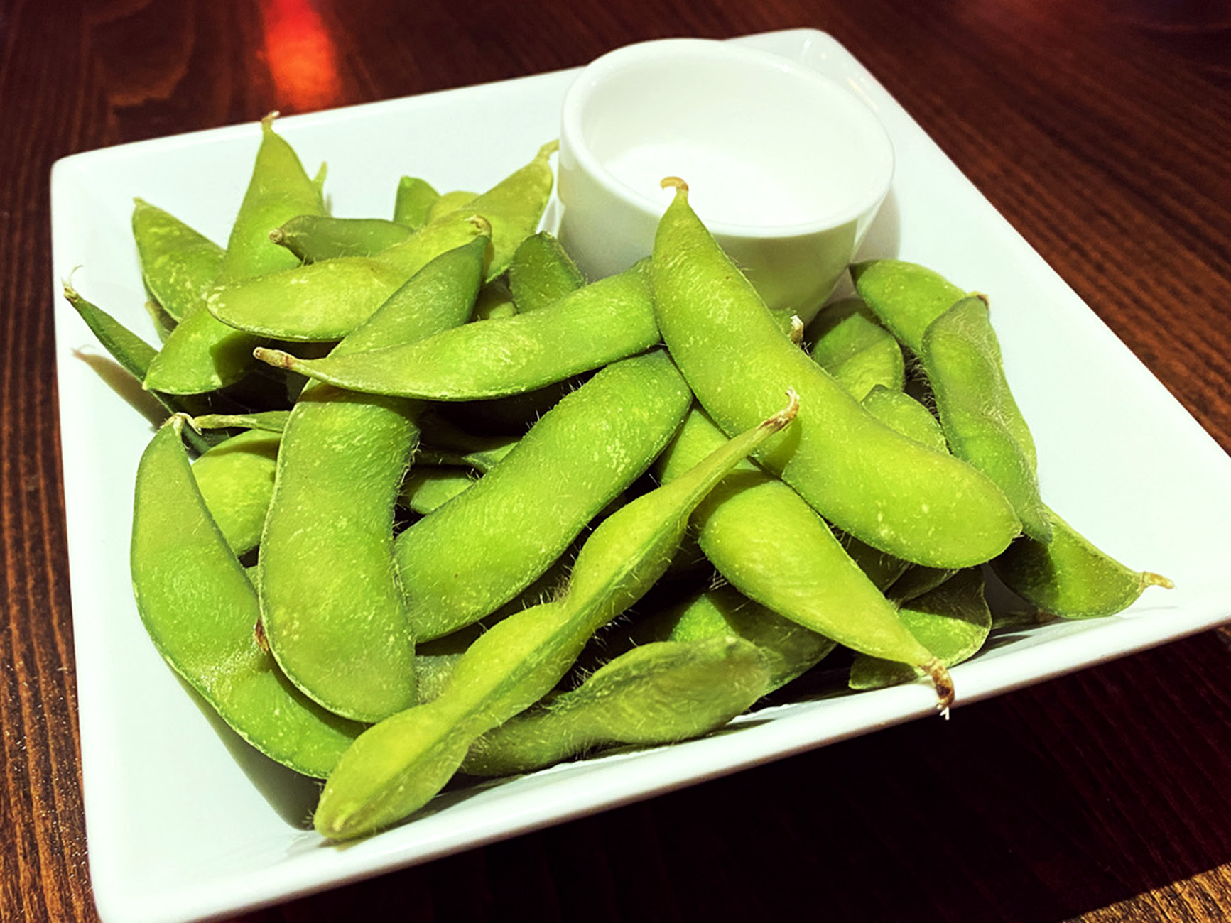 Order Edamame food online from Potstickers Asian Grill + Sushi store, Newark on bringmethat.com