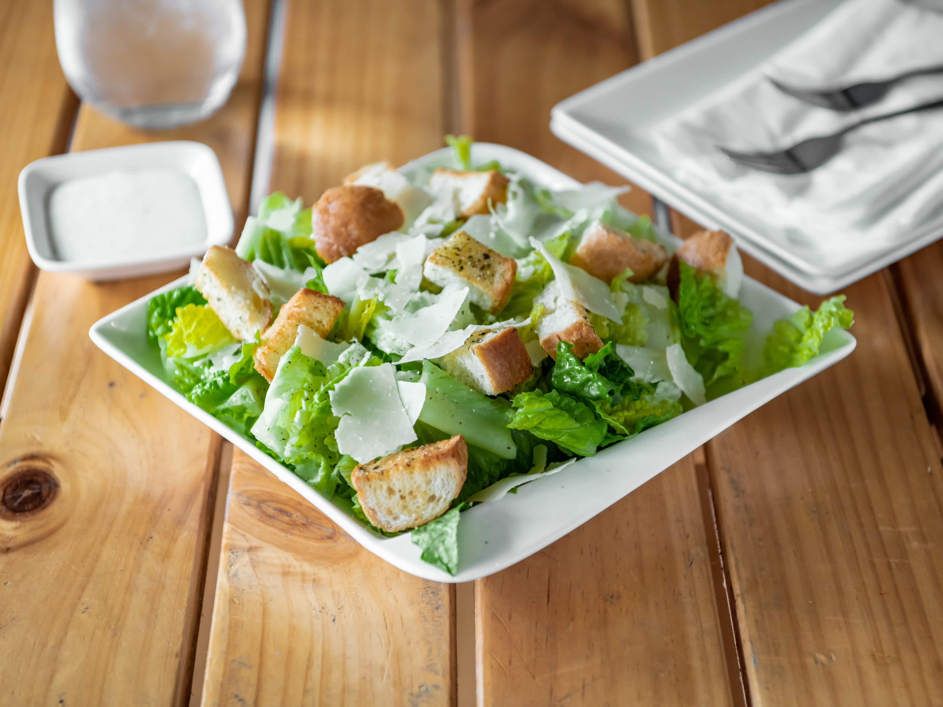 Order Caesar Salad food online from Red Tomato Pizza House store, Berkeley on bringmethat.com