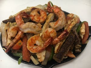 Order Trio Fajitas food online from Santa Ana Cafe store, Las Vegas on bringmethat.com
