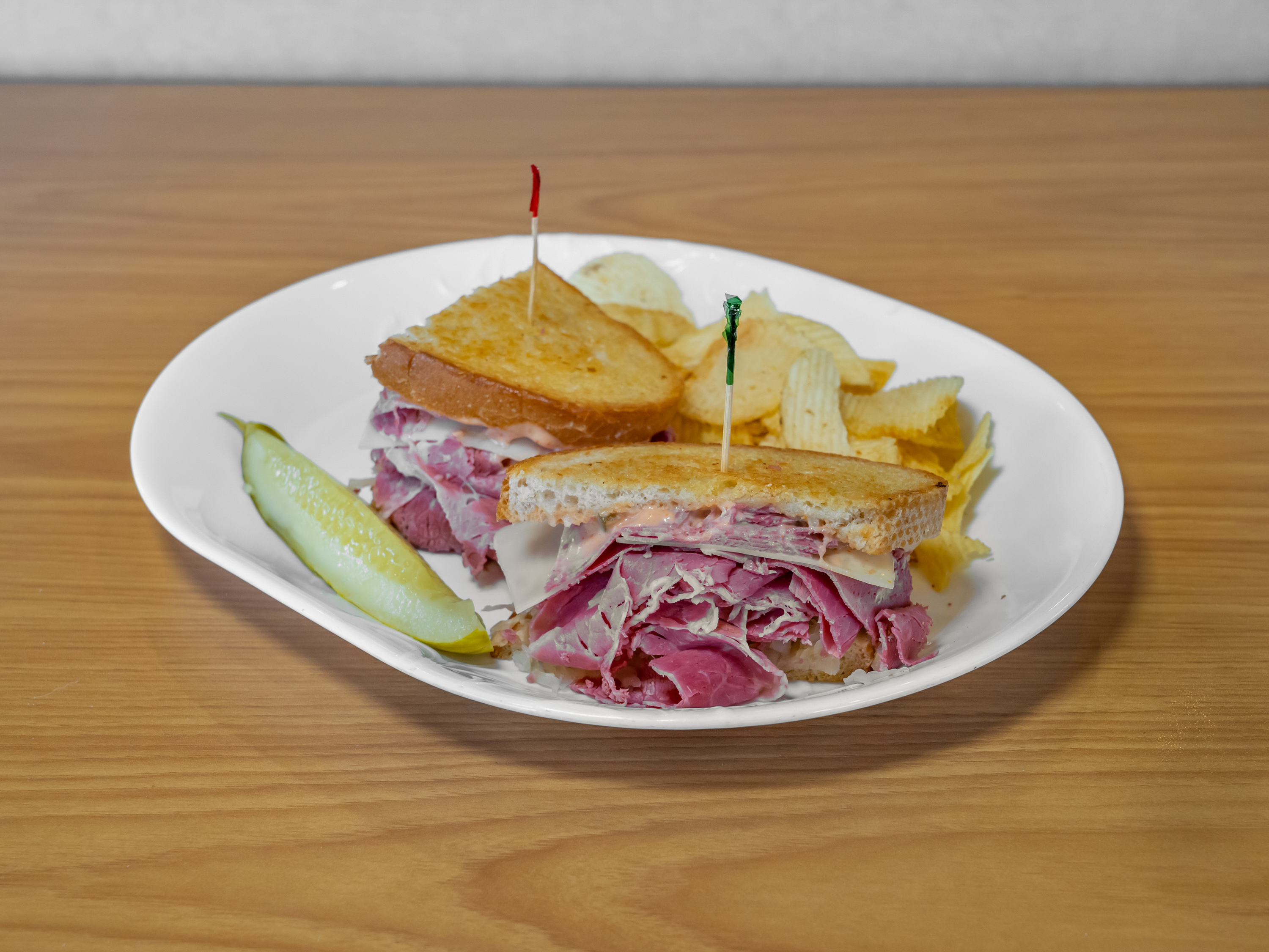 Order Reuben Sandwich food online from Rex Deli store, Harper Woods on bringmethat.com