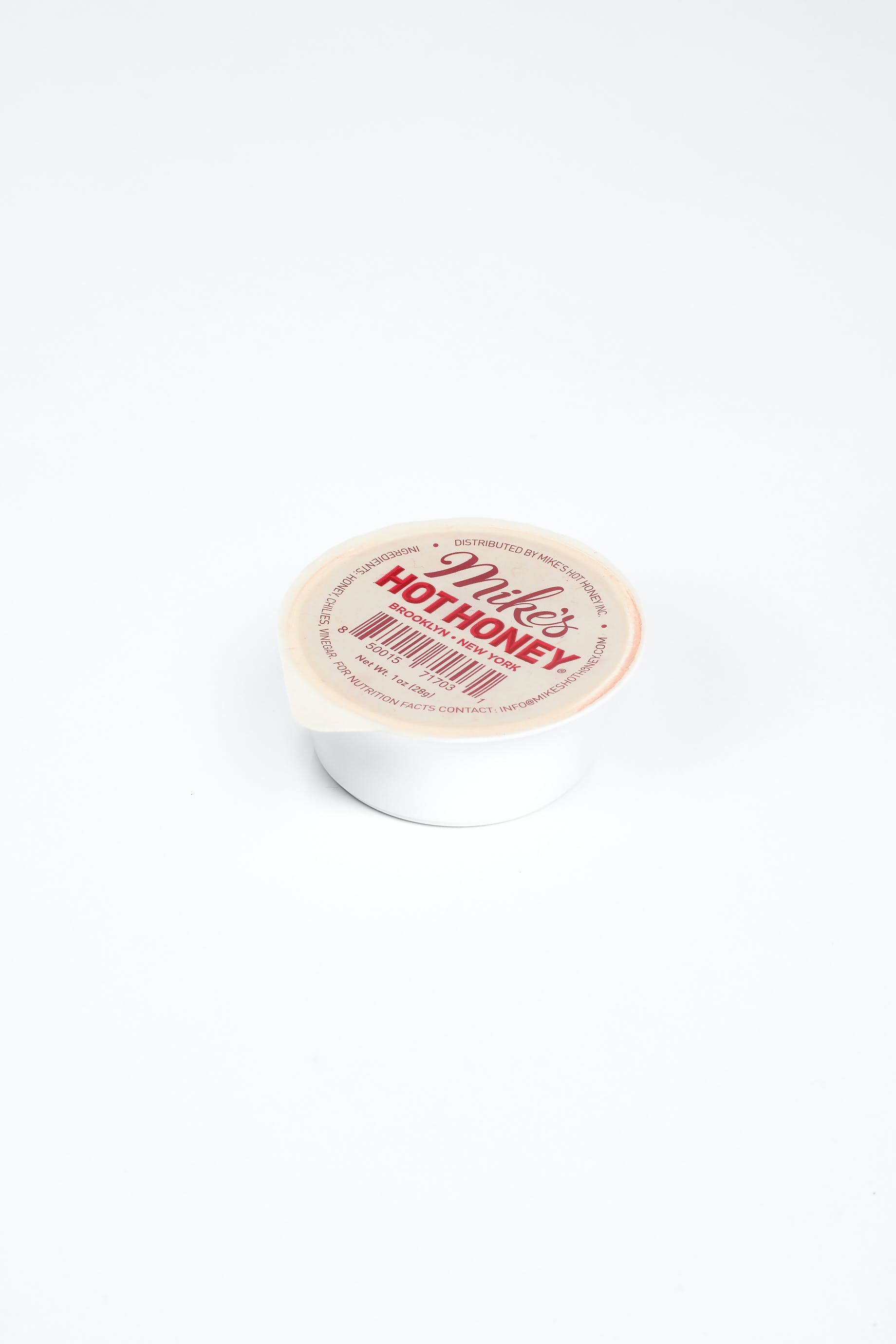 Order Mike’s Hot Honey Dip Cup - 1 oz. food online from Venice Pizza store, Linden on bringmethat.com
