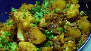 Order Aloo Mattar food online from Taste Of India Grill store, Bountiful on bringmethat.com