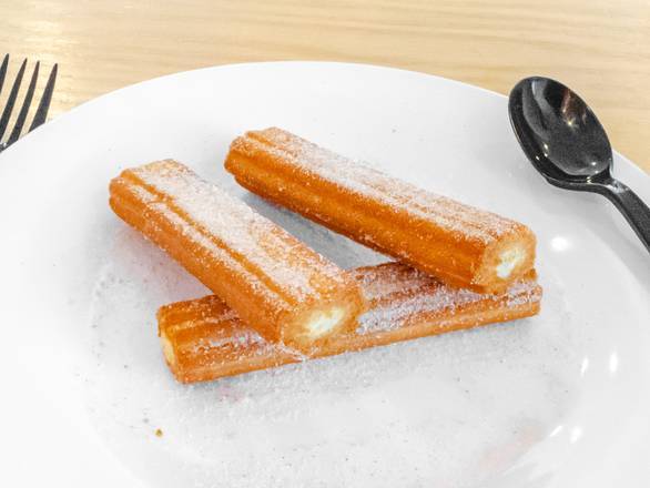 Order Creme-Filled Churros food online from Jimboys Tacos store, Roseville on bringmethat.com