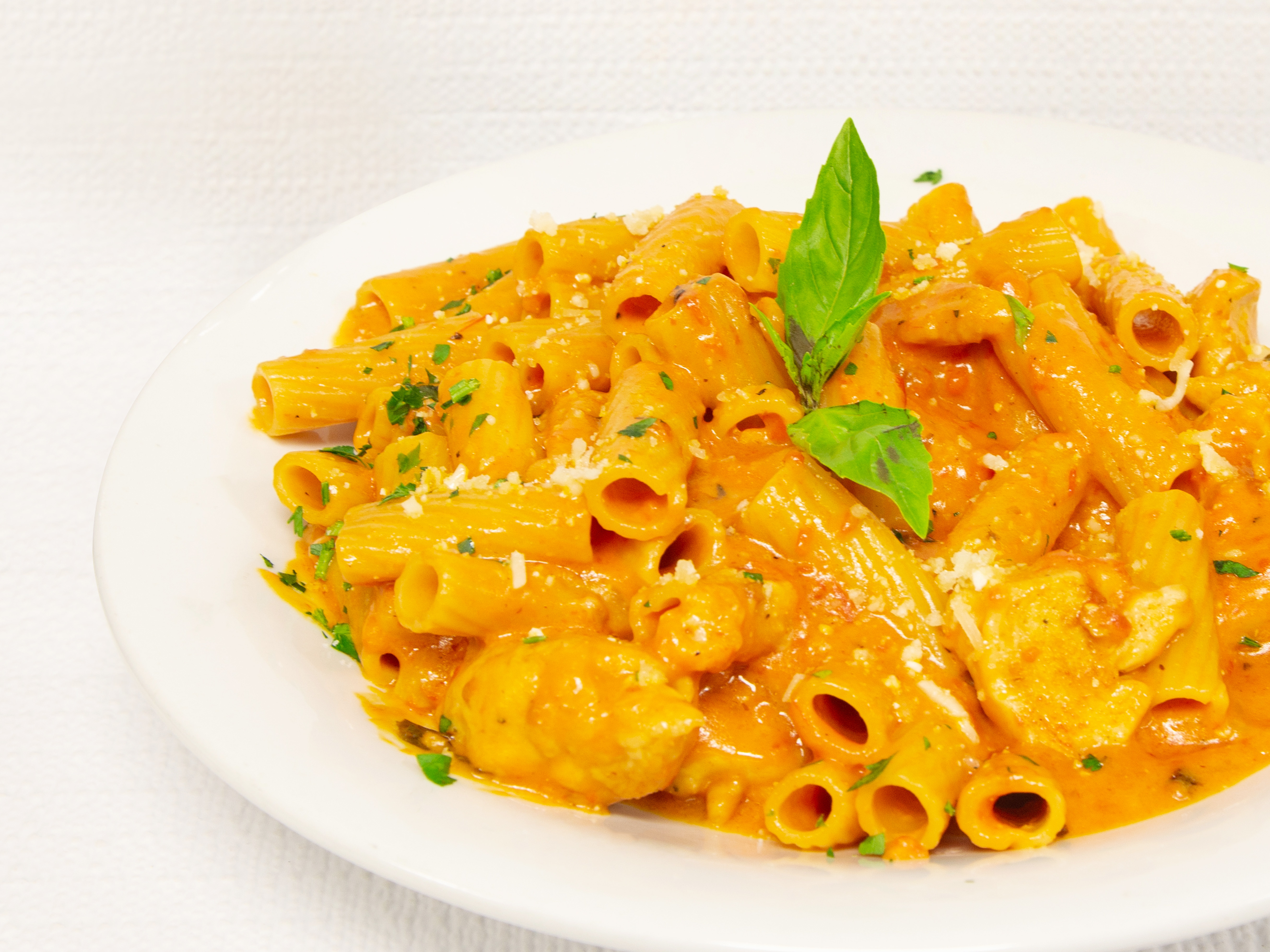 Order Rigatoni ala Vodka with Chicken food online from Gotham City Diner store, Fair Lawn on bringmethat.com