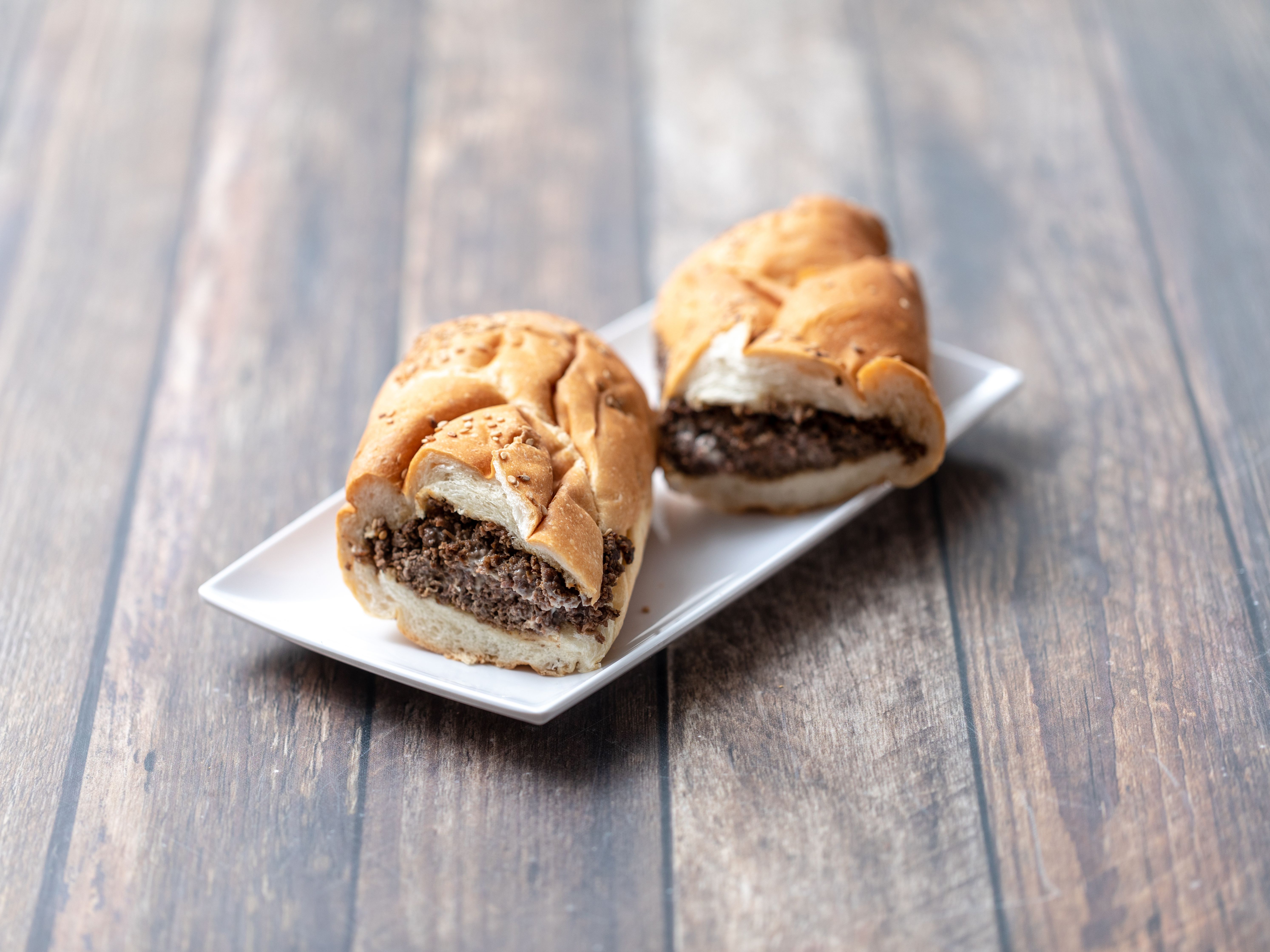Order Philly Steak and Cheese food online from Big Belly Deli store, Somerville on bringmethat.com