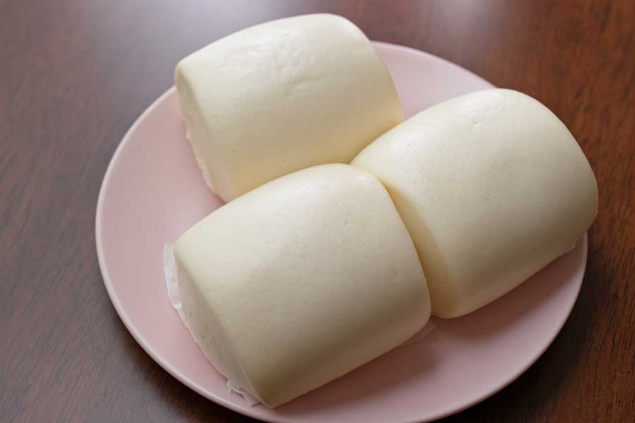 Order STEAMED BUNS food online from District One Kitchen & Bar store, Las Vegas on bringmethat.com