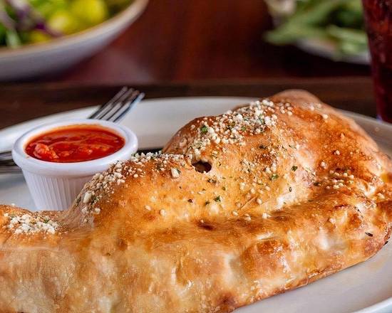 Order CYO Calzone food online from New York Pizzeria store, Houston on bringmethat.com