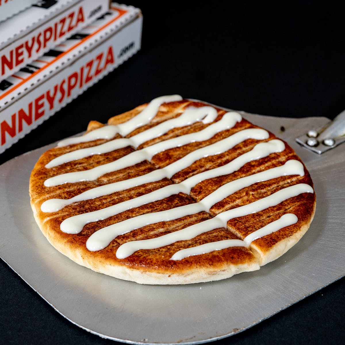 Order Cinnamon Bread - Breadsticks food online from Tenney's Pizza store, Saratoga Springs on bringmethat.com