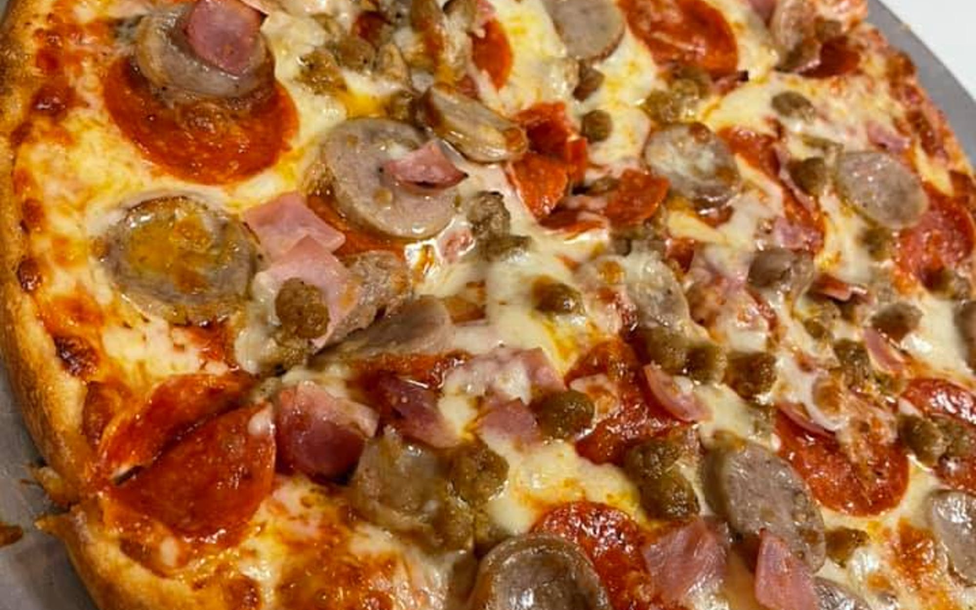 Order All Meat Lovers food online from Good Fellas Pizza store, Warrenton on bringmethat.com