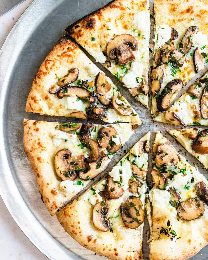 Order Mushrooms Pizza - Small 10'' food online from Lucy's Pizza Parlor store, Stamford on bringmethat.com