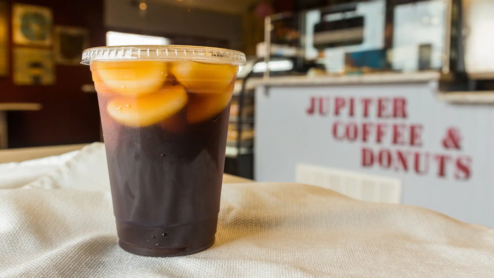 Order Iced Coffee food online from Jupiter Coffee & Donuts store, Fairfield on bringmethat.com