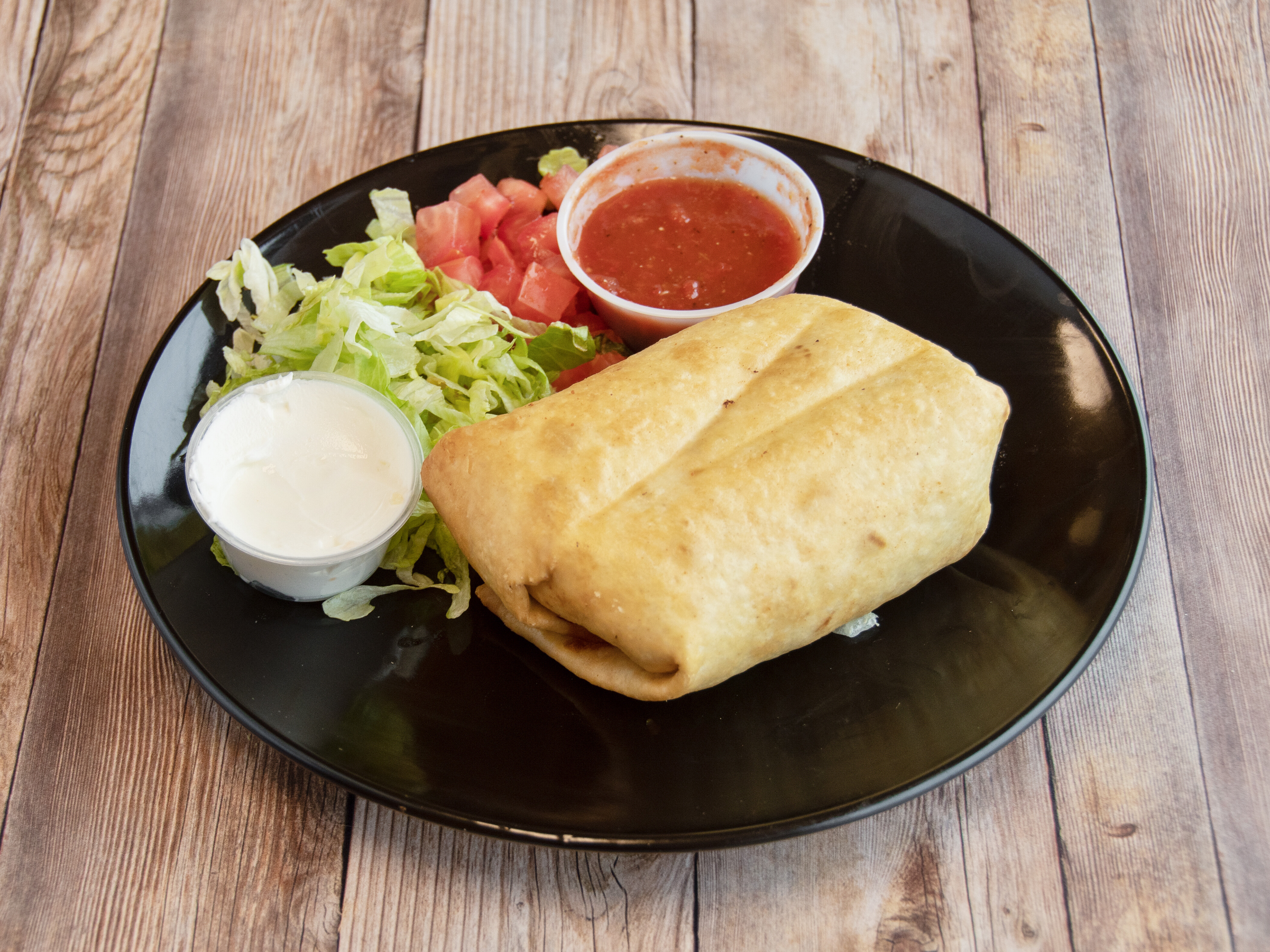 Order Chimichanga food online from Trini Mexican Carry Out store, New Baltimore on bringmethat.com