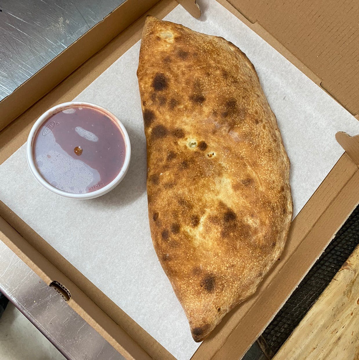 Order Calzone - Small food online from Pujols Pizzeria store, Bethlehem on bringmethat.com