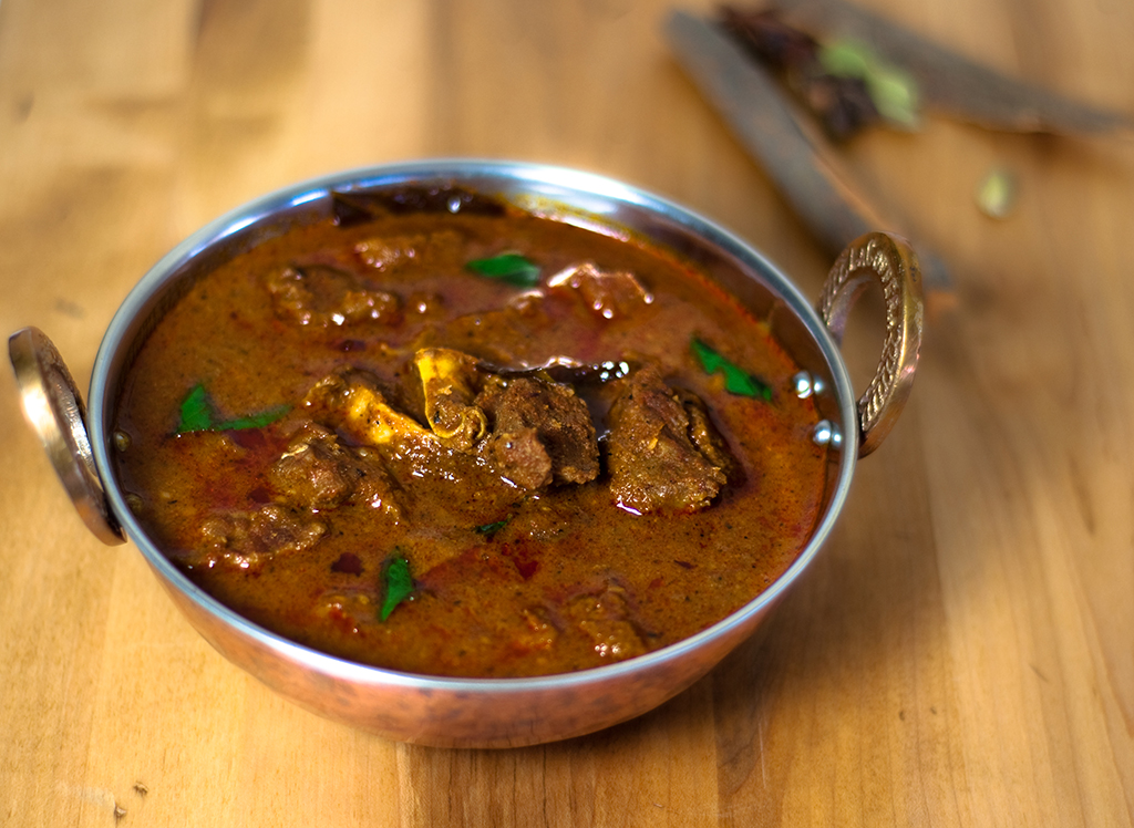 Order Goat Curry food online from Oasis Palace Restaurant store, Newark on bringmethat.com