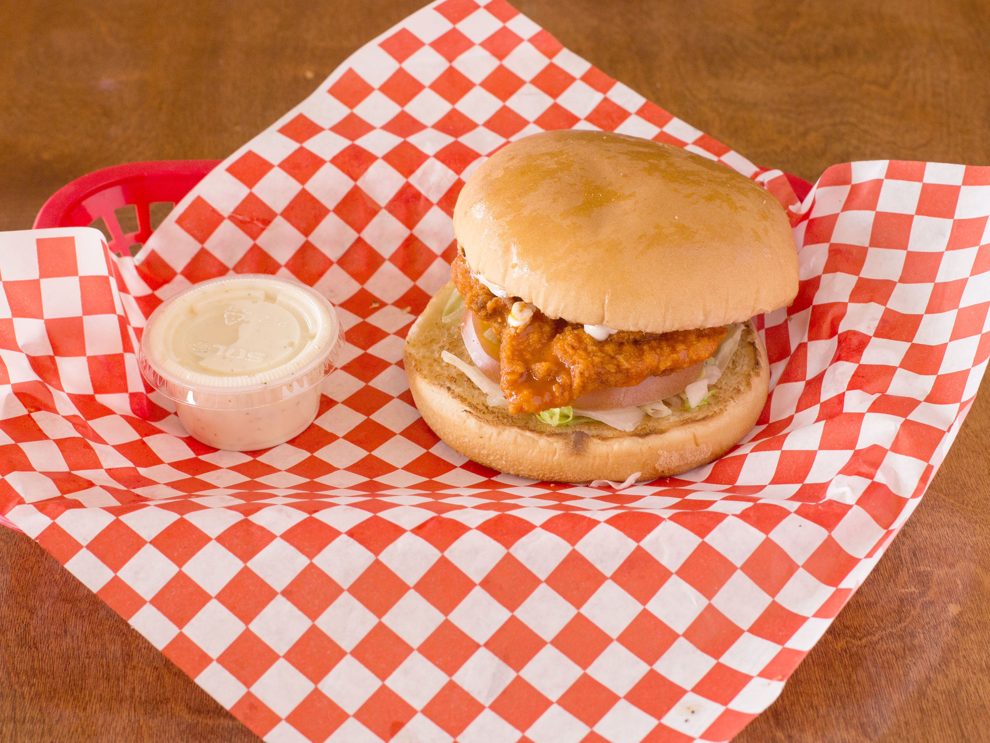 Order Buffalo Chicken Sandwich food online from Burger Island store, Dallas on bringmethat.com