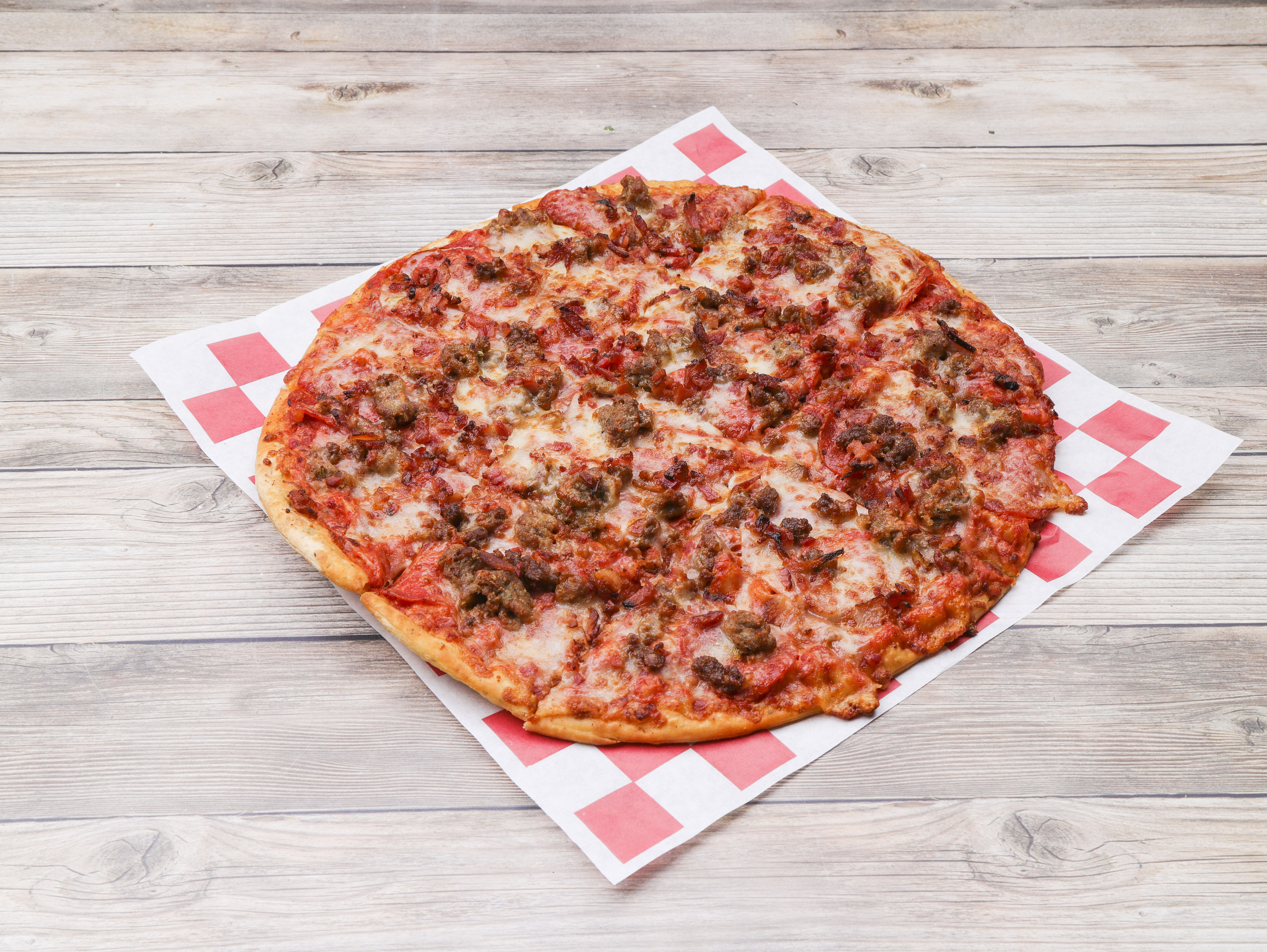 Order 19. The Meatza Pizza food online from Boss Chicken & Pizza store, Lincoln on bringmethat.com