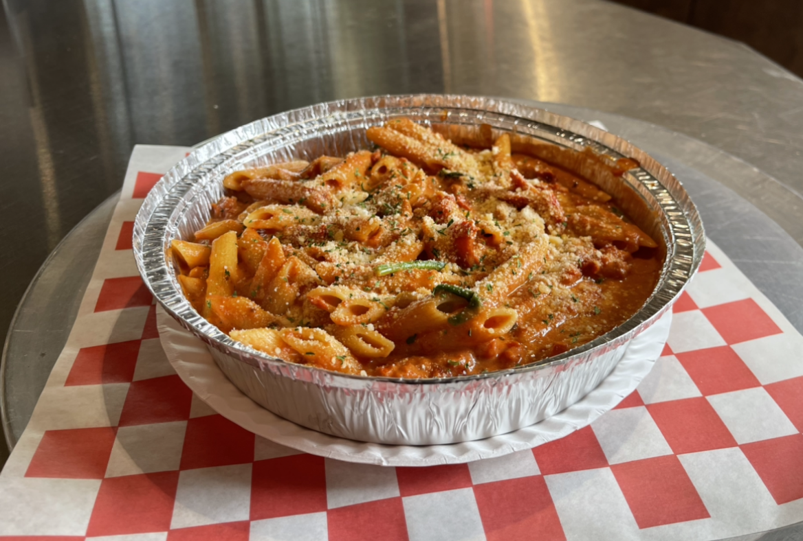 Order Penne Alla Casa food online from Johnny's Pizza store, Cary on bringmethat.com