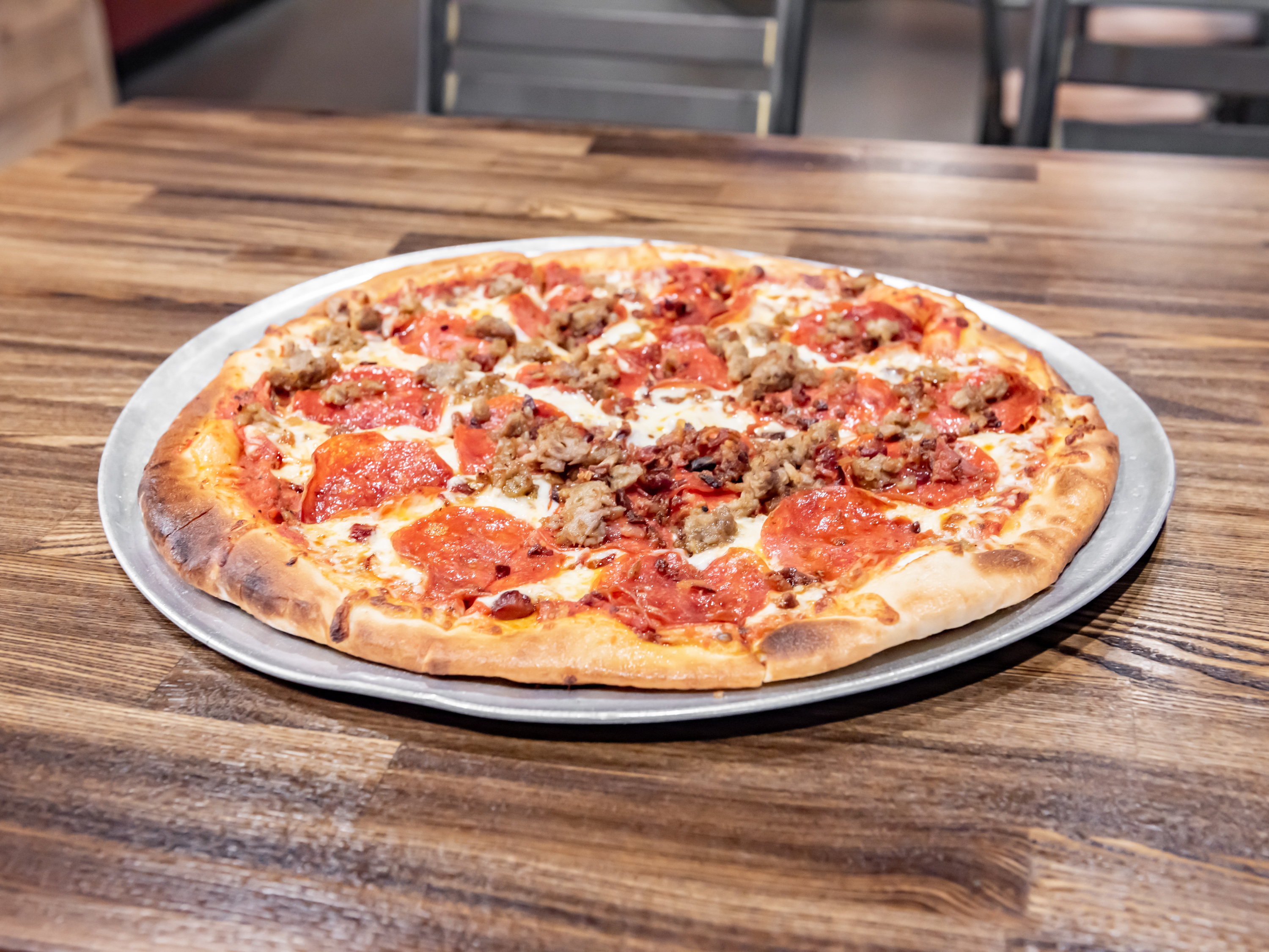 Order Mighty Meat Pizza food online from Ten Pin Alley store, Hilliard on bringmethat.com