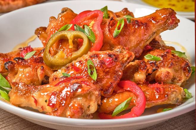 Order Twice-Baked Brick Oven Honey Chili Chicken Wings  food online from Bertuccis Restaurant store, Wilmington on bringmethat.com