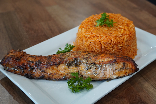 Order Jollof Rice and Blackened Salmon food online from Fusion Vibes Kitchen + Bar store, Richardson on bringmethat.com