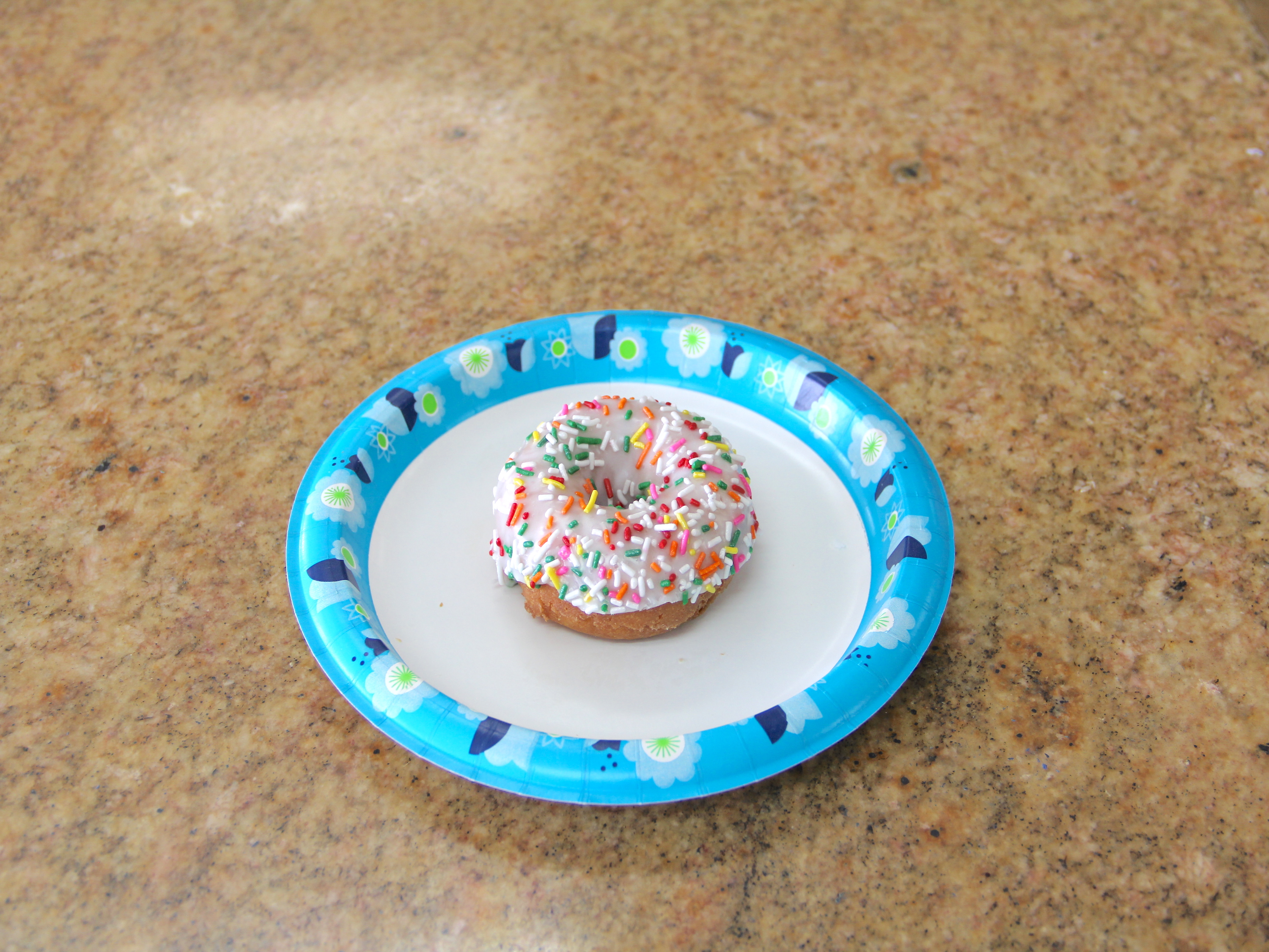 Order White Cake with Sprinkles food online from Kenny Donuts store, Corona on bringmethat.com