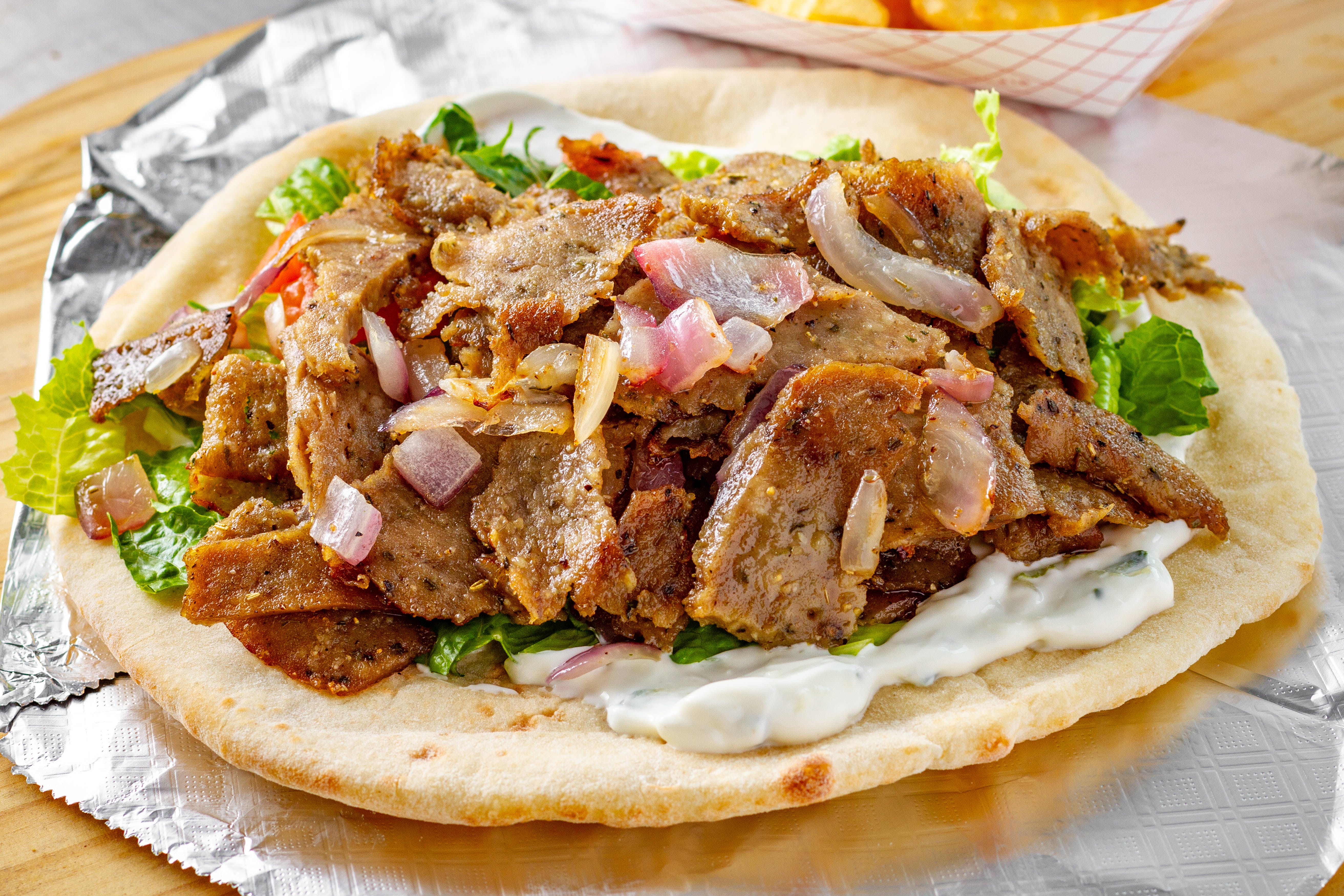 Order Lamb Gyro - Pita Sandwiches food online from Al Pacino Pizza store, Baltimore on bringmethat.com