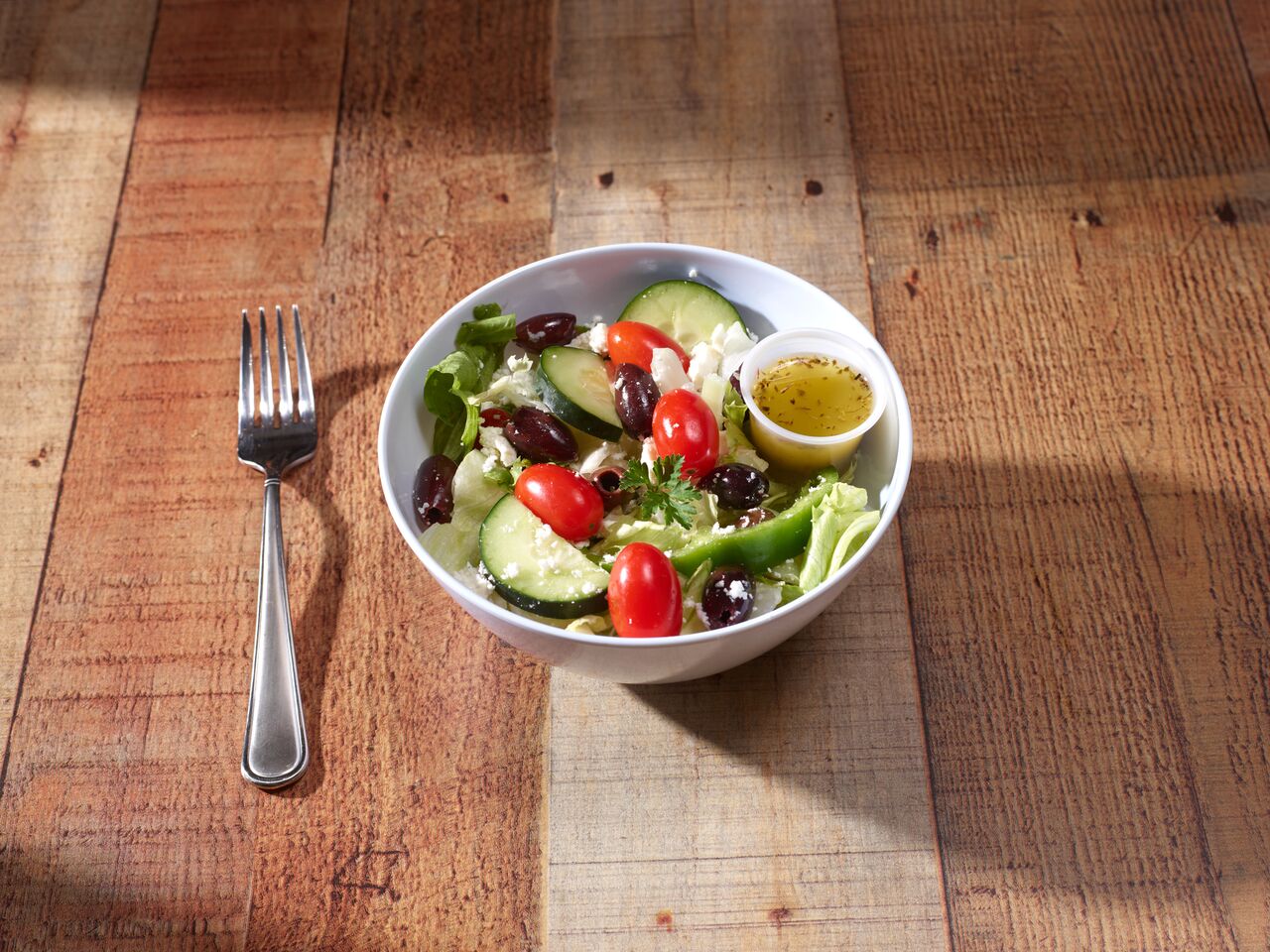 Order Greek Salad food online from Goodies Mediterranean store, Syracuse on bringmethat.com