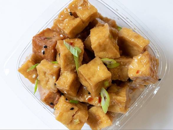 Order Small Crispy Orange Tofu* food online from Caviar & Bananas store, Charleston on bringmethat.com