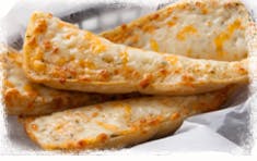Order Garlic Bread with Cheese - Twists & Sides food online from Round Table Pizza store, Concord on bringmethat.com