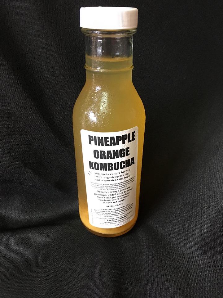 Order Pineapple Orange Kombucha food online from Pat Greer's Kitchen store, Houston on bringmethat.com