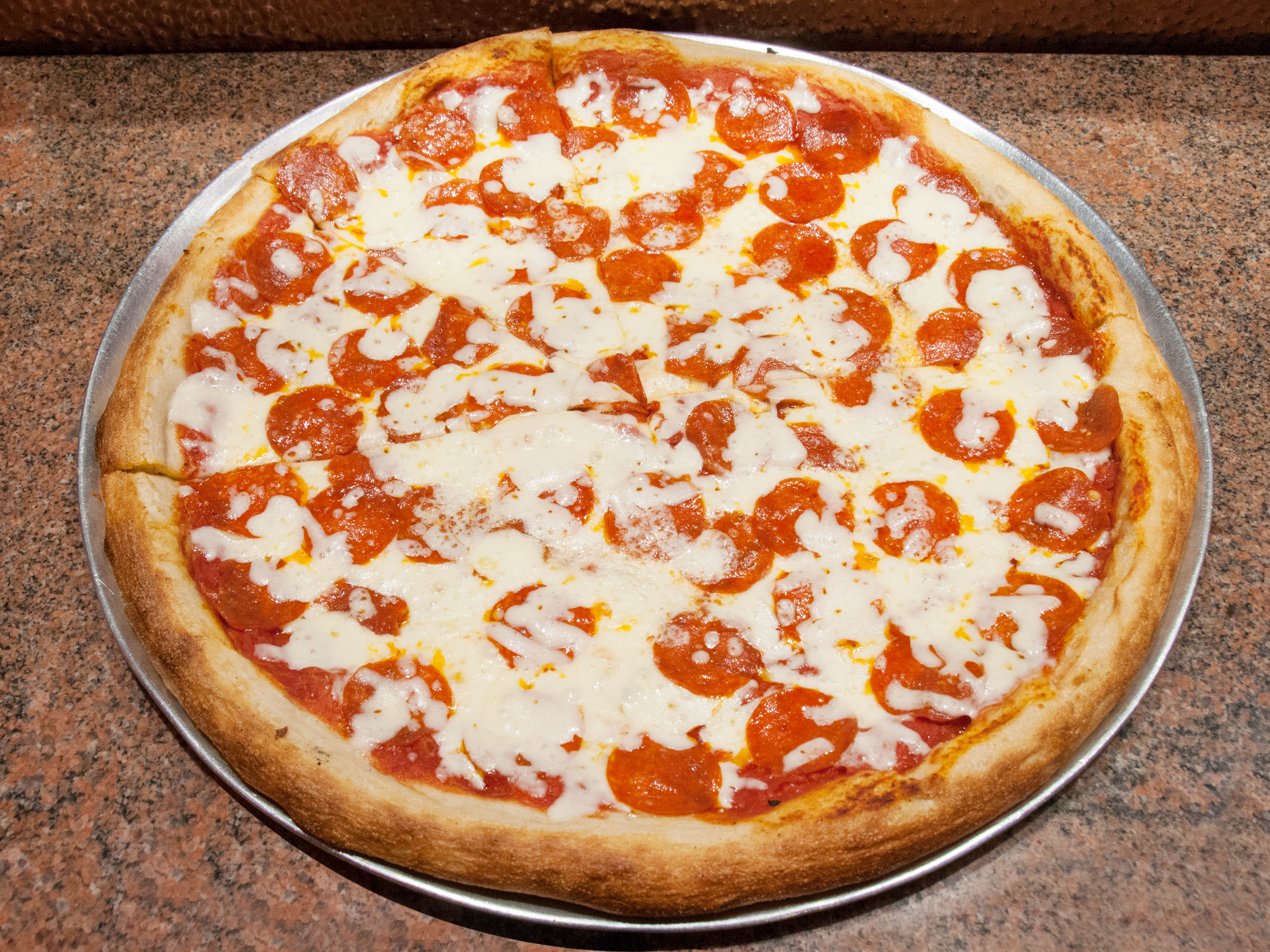 Order Cheese Pizza food online from Bravo pizza store, New York on bringmethat.com