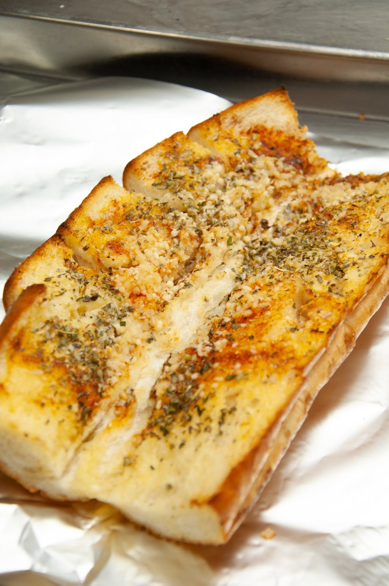Order Garlic Bread - Appetizer food online from Sali's Italian store, McKinney on bringmethat.com