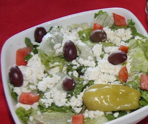 Order * Greek Salad food online from Zorbas Fine Greek Cuisine store, Albuquerque on bringmethat.com