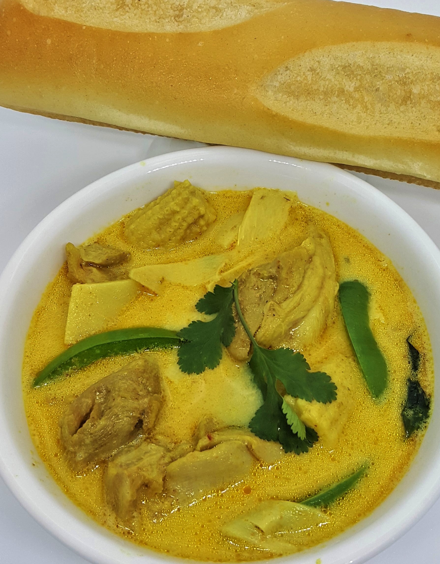 Order Thai Curry Chicken w/side baguette food online from CM Banh Mi store, Hillsboro on bringmethat.com