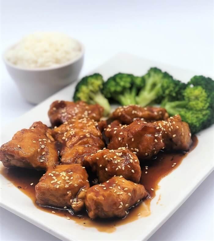 Order SESAME CHICKEN food online from Kim Son Cafe  store, Houston on bringmethat.com