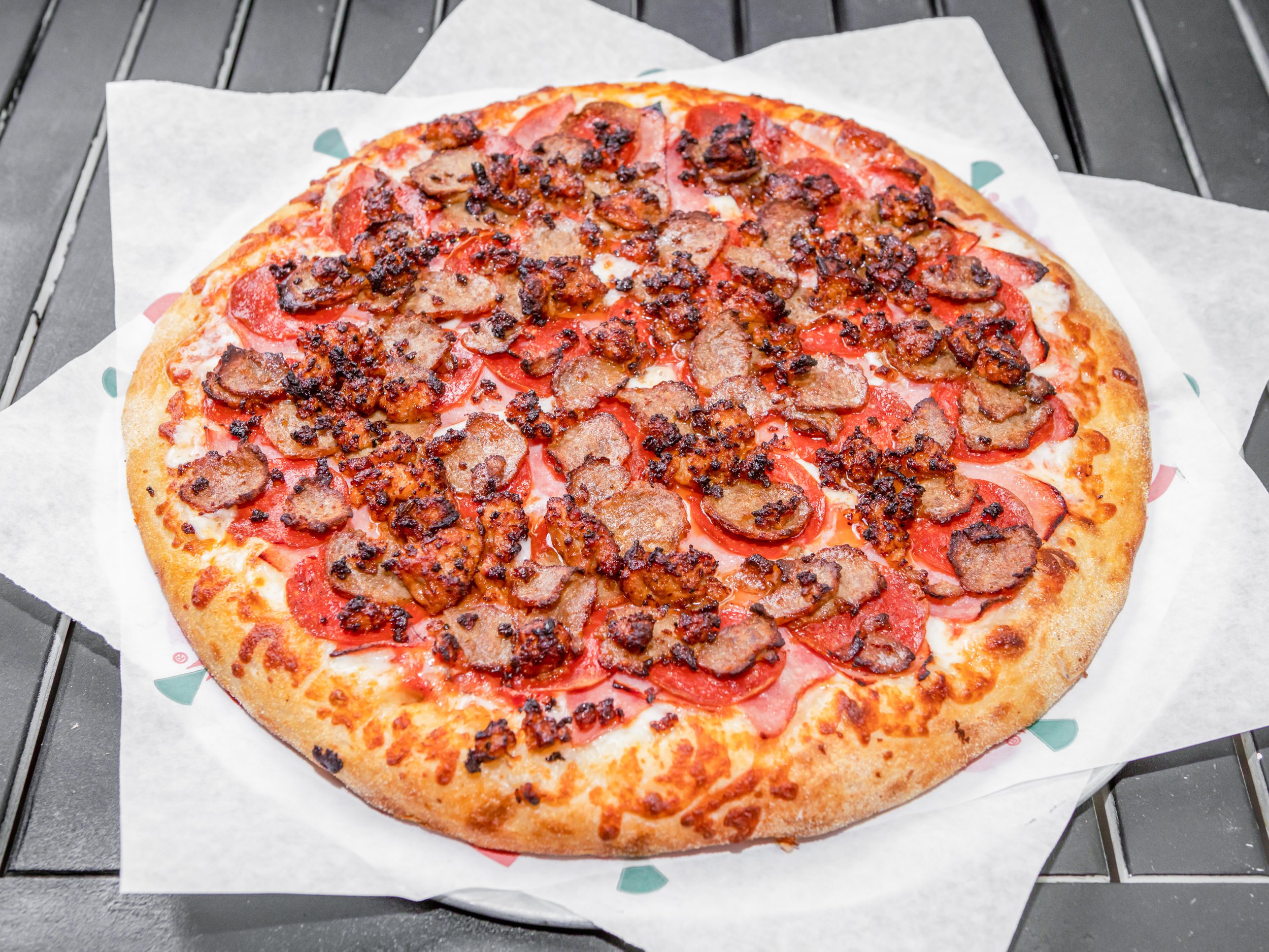 Order Meat Lovers Pizza food online from Ameci Pizza store, Brentwood on bringmethat.com