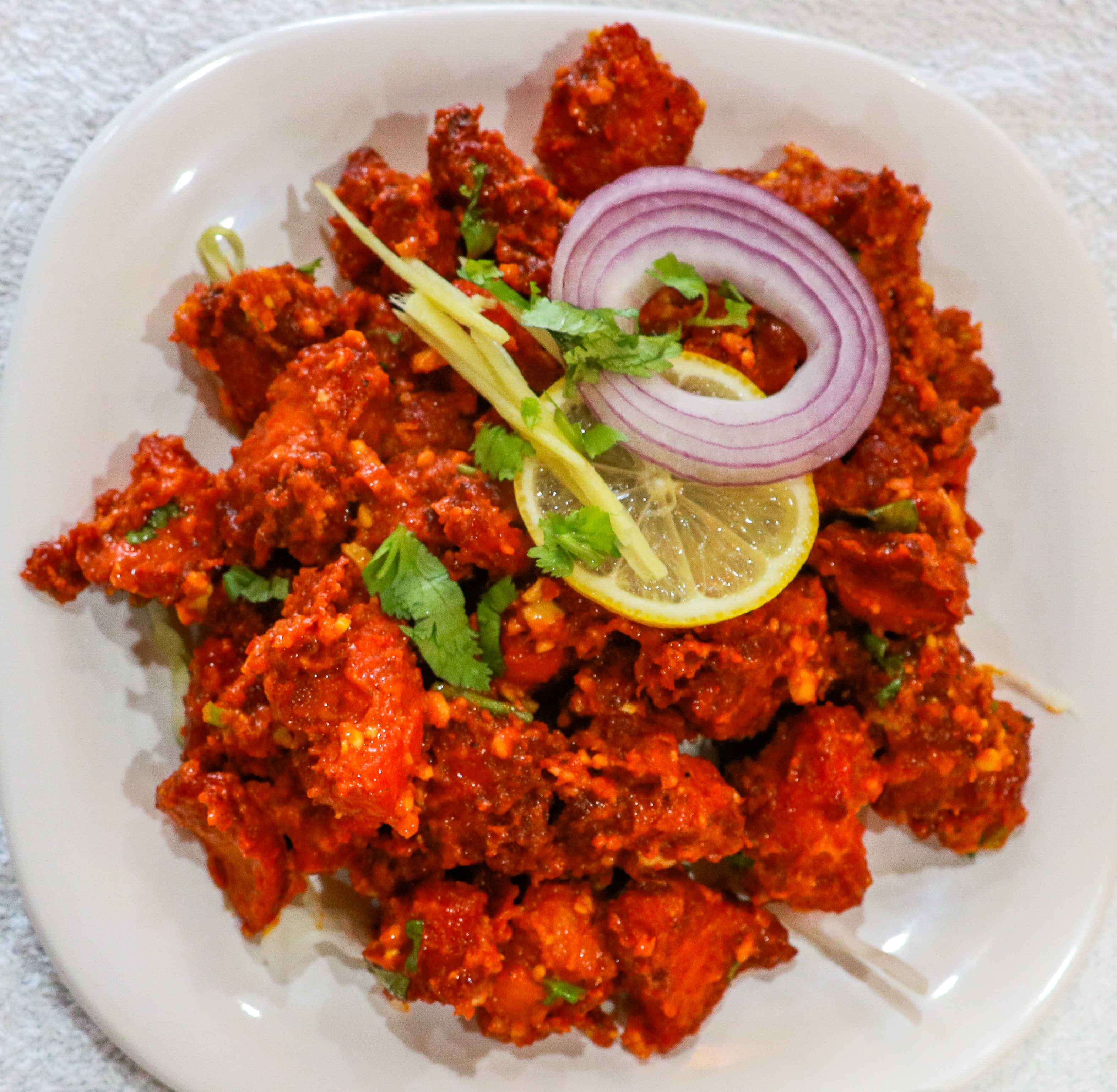 Order Guntur Chicken food online from Bawarchi Biryanis Indian Cuisine store, Mason on bringmethat.com