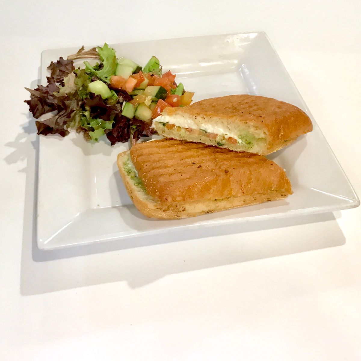 Order Caprese Panini food online from Crave Cafe store, Pasadena on bringmethat.com