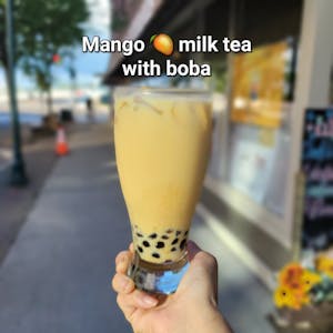 Order Mango milk tea food online from Siam Elephants Restaurant store, Elmira on bringmethat.com