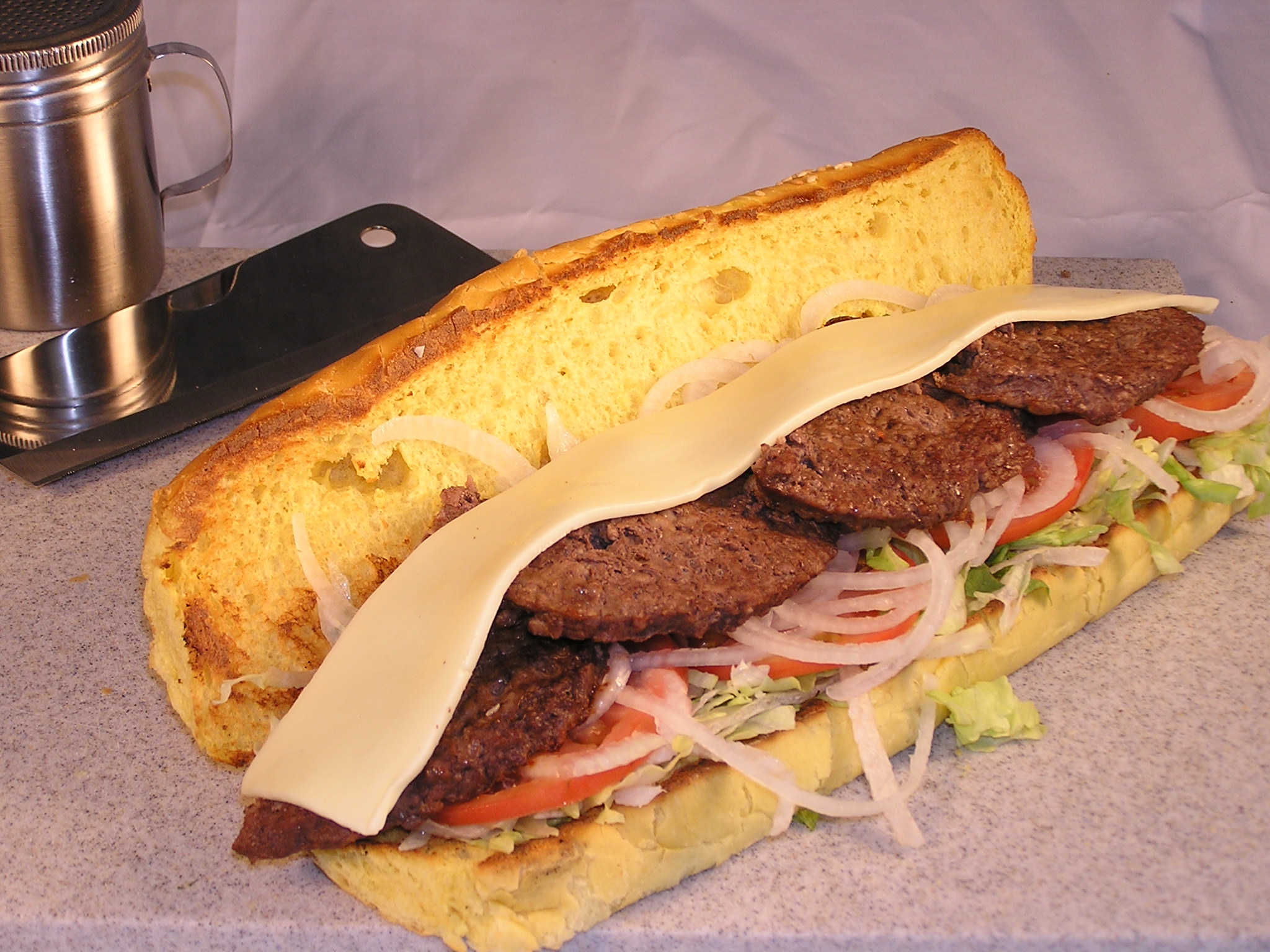 Order Cheeseburger Sub food online from Calz Pizza Subs & Chicken Wings store, Virginia Beach on bringmethat.com