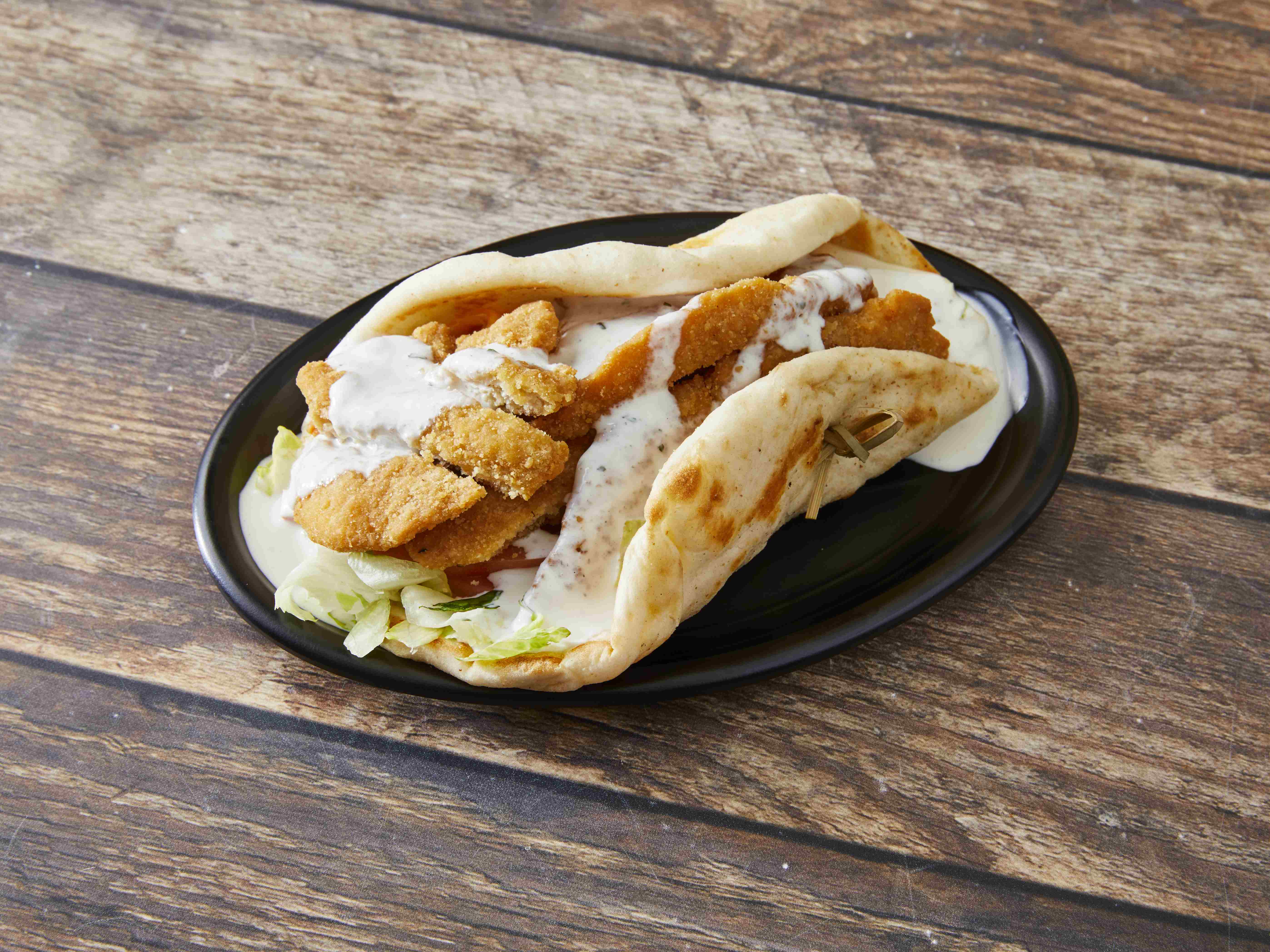 Order Chicken Fingers Pita food online from Leo's Coney Island - Order Delivery store, East Lansing on bringmethat.com