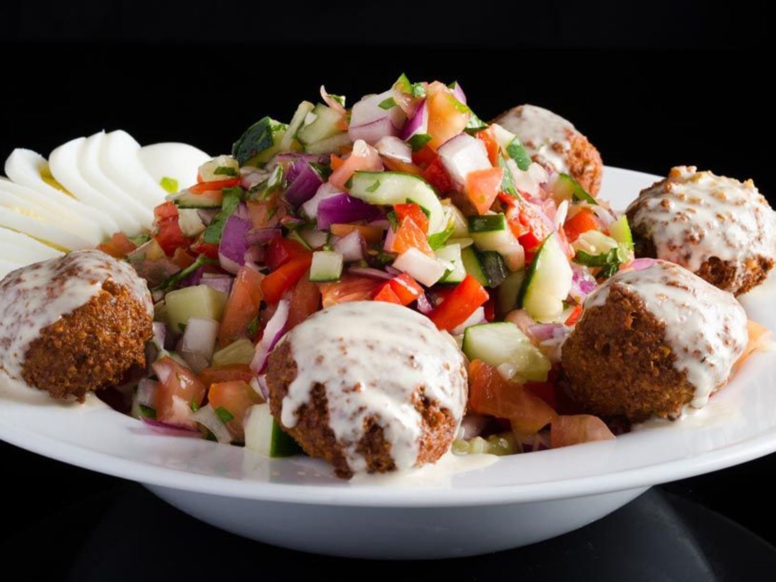 Order Authentic Israeli Salad food online from cafe muscat store, Fresh Meadows on bringmethat.com