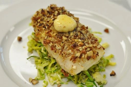 Order Garlic Aioli Pecan Crusted Cod over Herb Rice Pilaf food online from The Spice Of Life Catering store, Carrollton on bringmethat.com