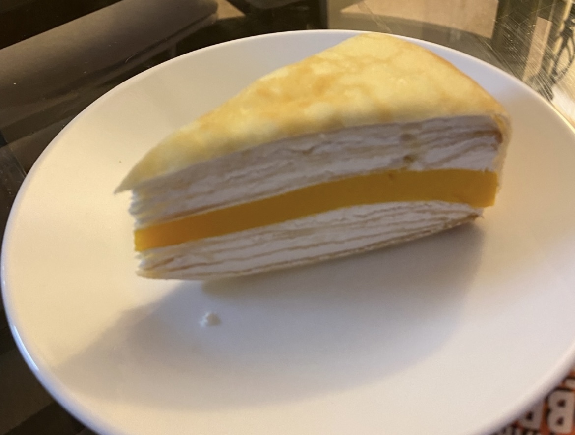 Order mango tango mille crepe cakes food online from Osaki Sushi & Hibachi store, Duncanville on bringmethat.com